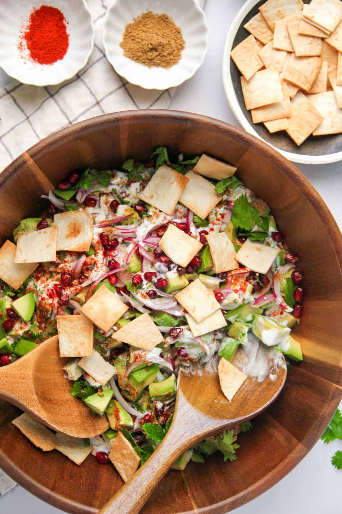 chickpea avocado chaat in a wooden salald bowl
