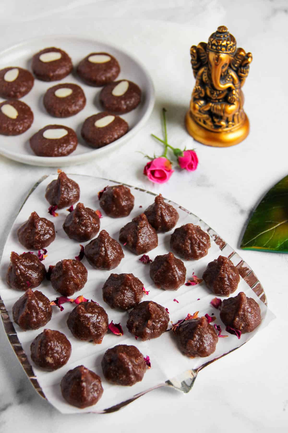 chocloate modak and peda in 2 plates