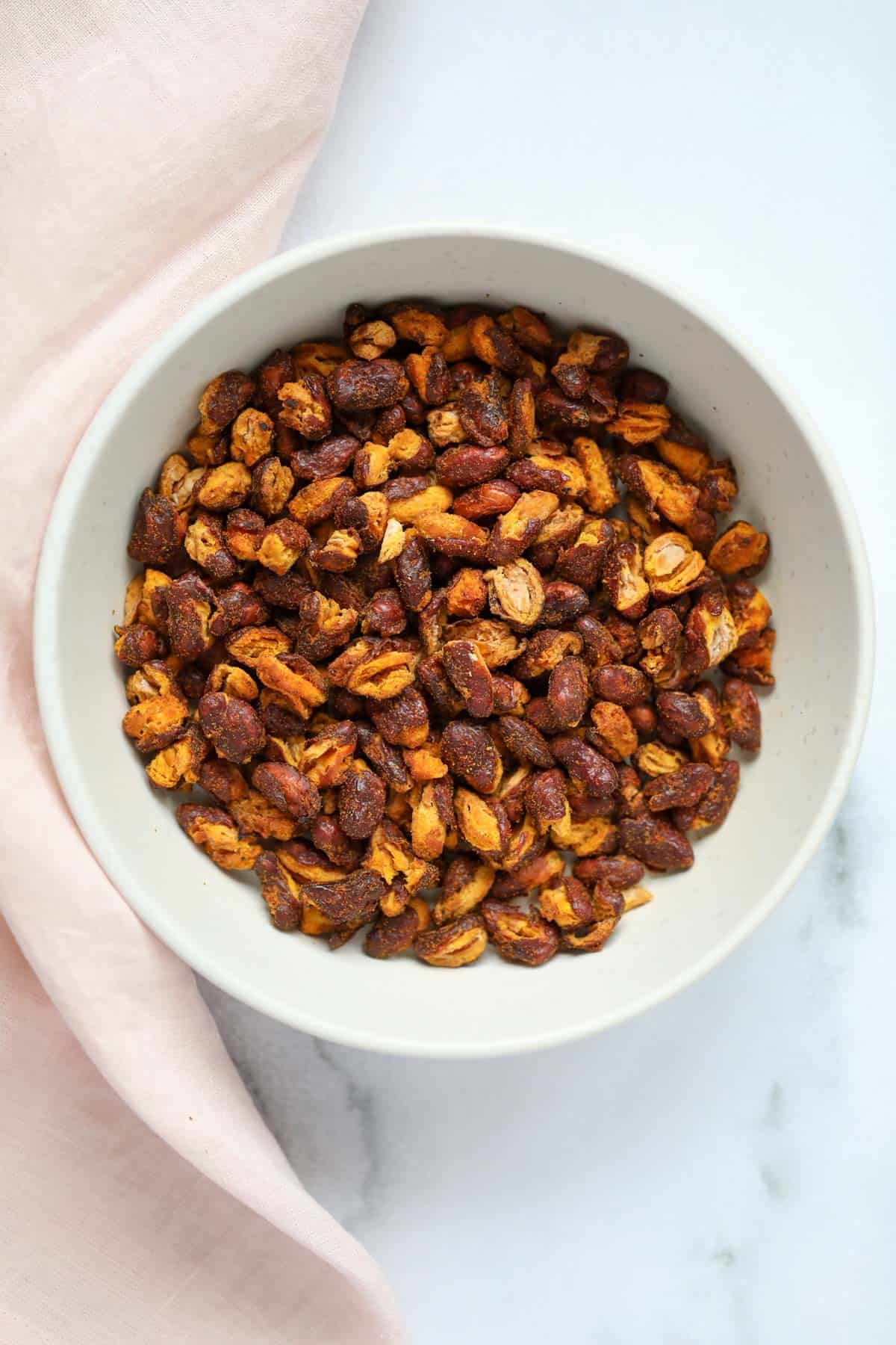 crispy kidney beans snack served in a white bowl 
