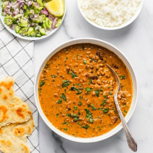 dal makhani in a bowl with rice