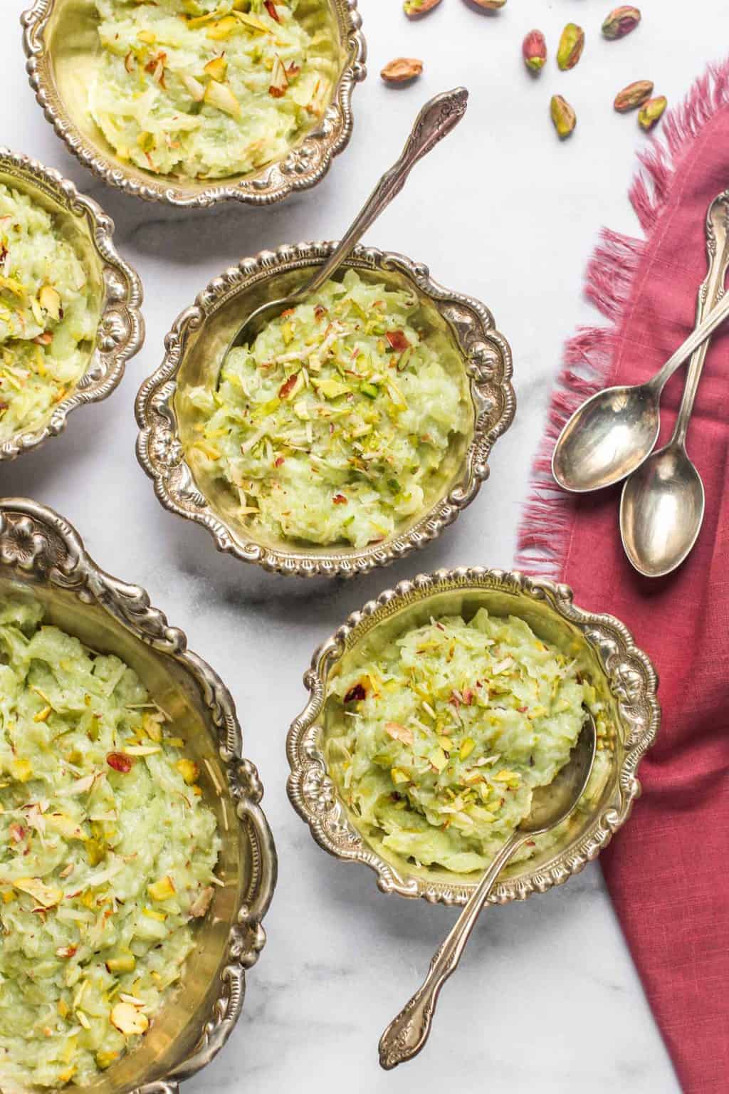 dudhi halwa served in 3 silver bowls 