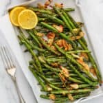 green beans topped with crispy garlic chips