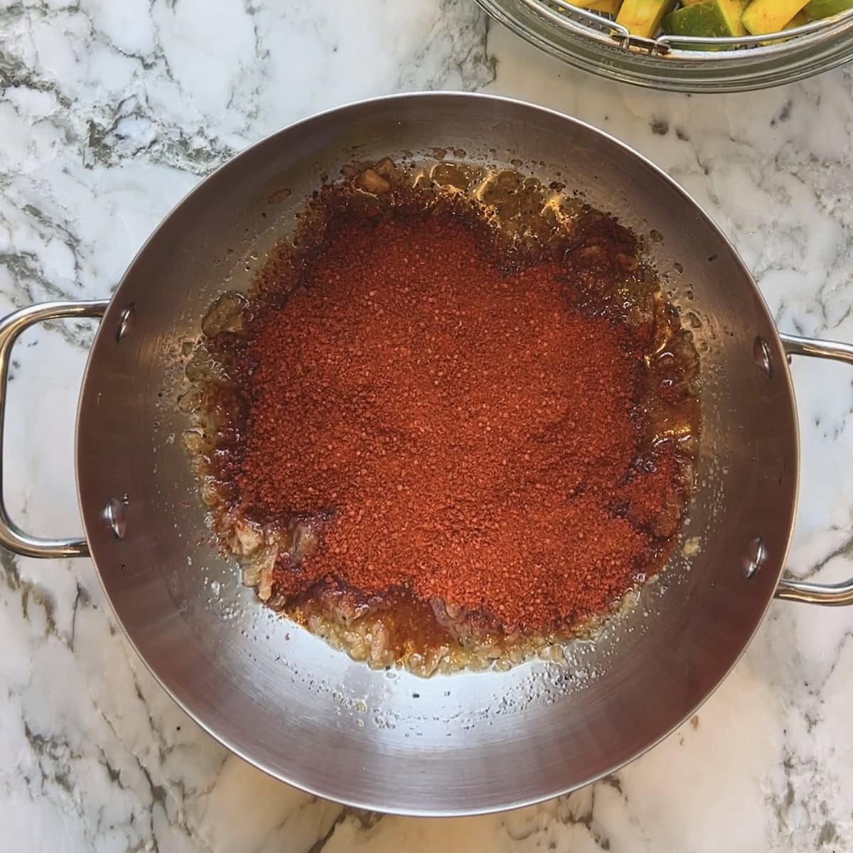 pickle masala added to the oil and jaggery.