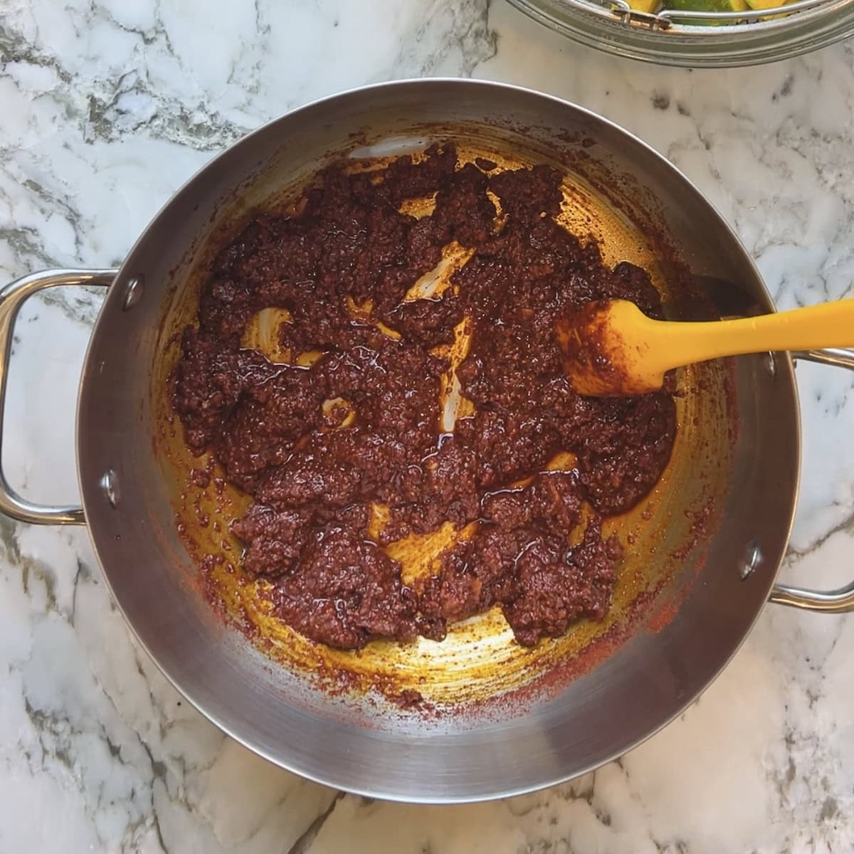 pickle masala mixed in oil, mustard seeds and jaggery.