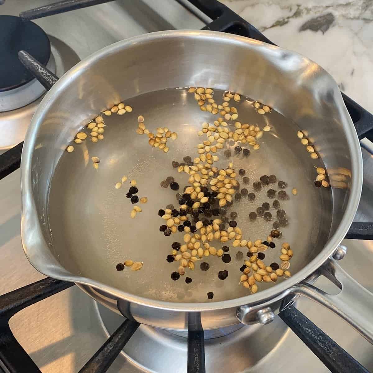 vinegar brine with coriander seeds and black pepper