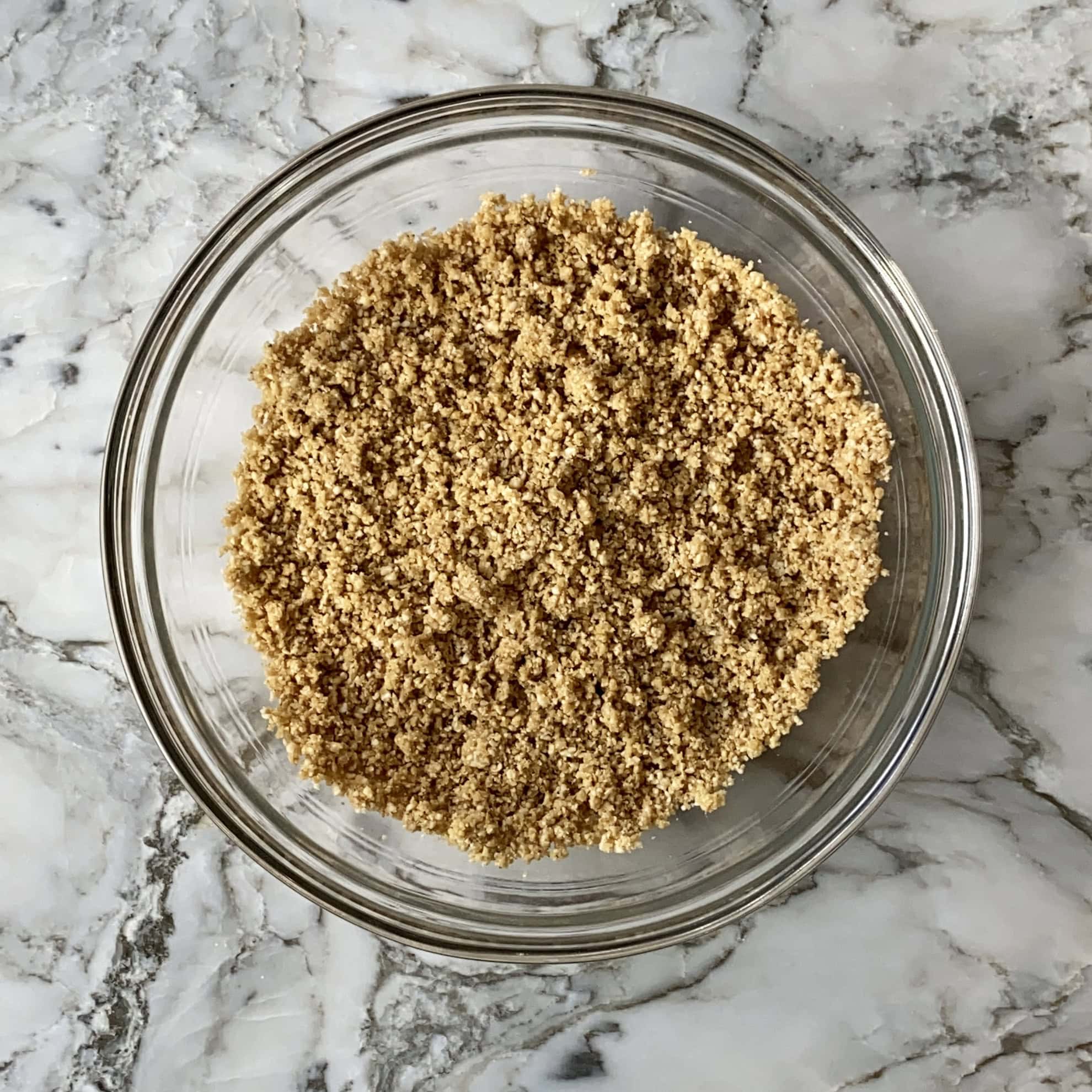 til gud laddu mixture in a glass bowl.