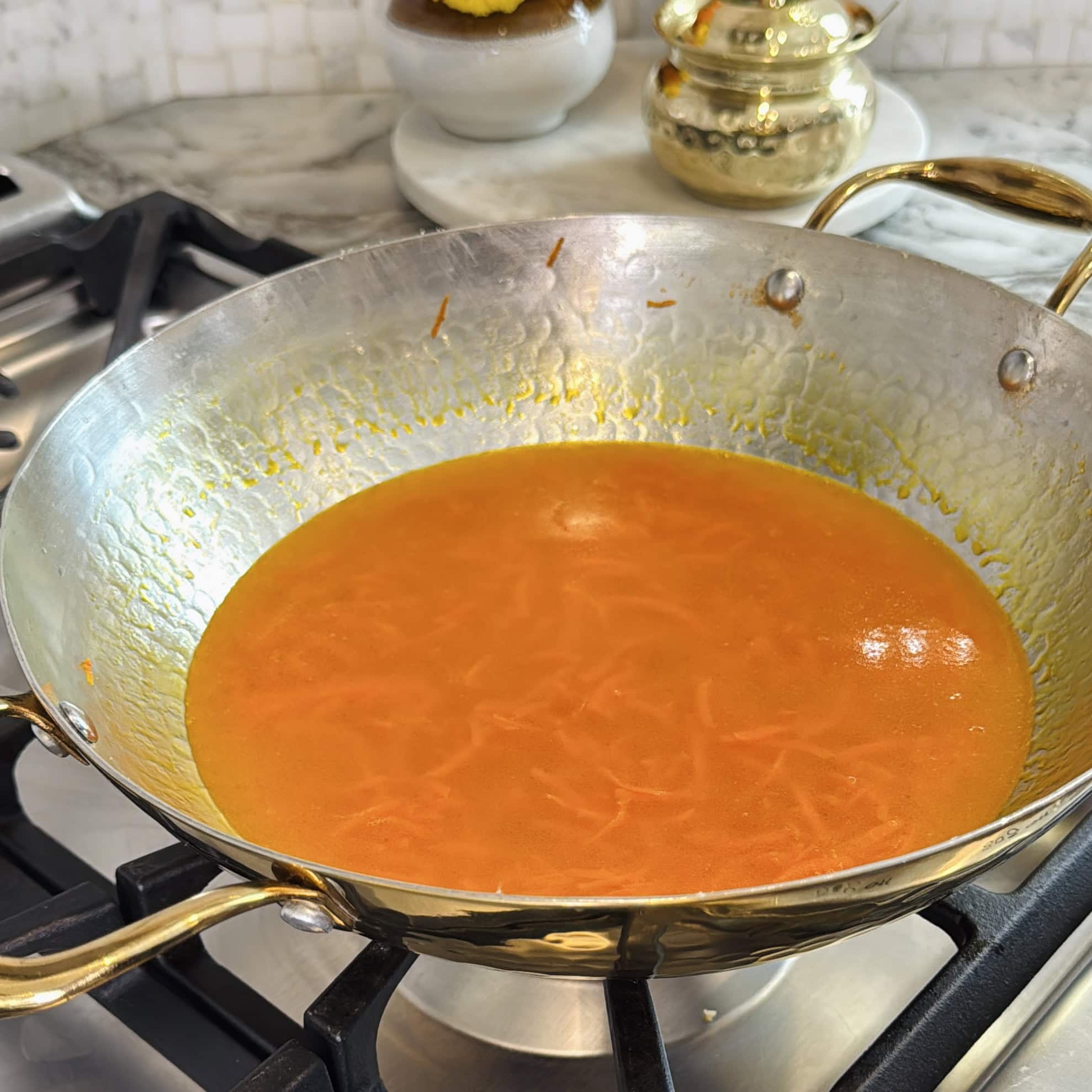 water added to grated carrots.