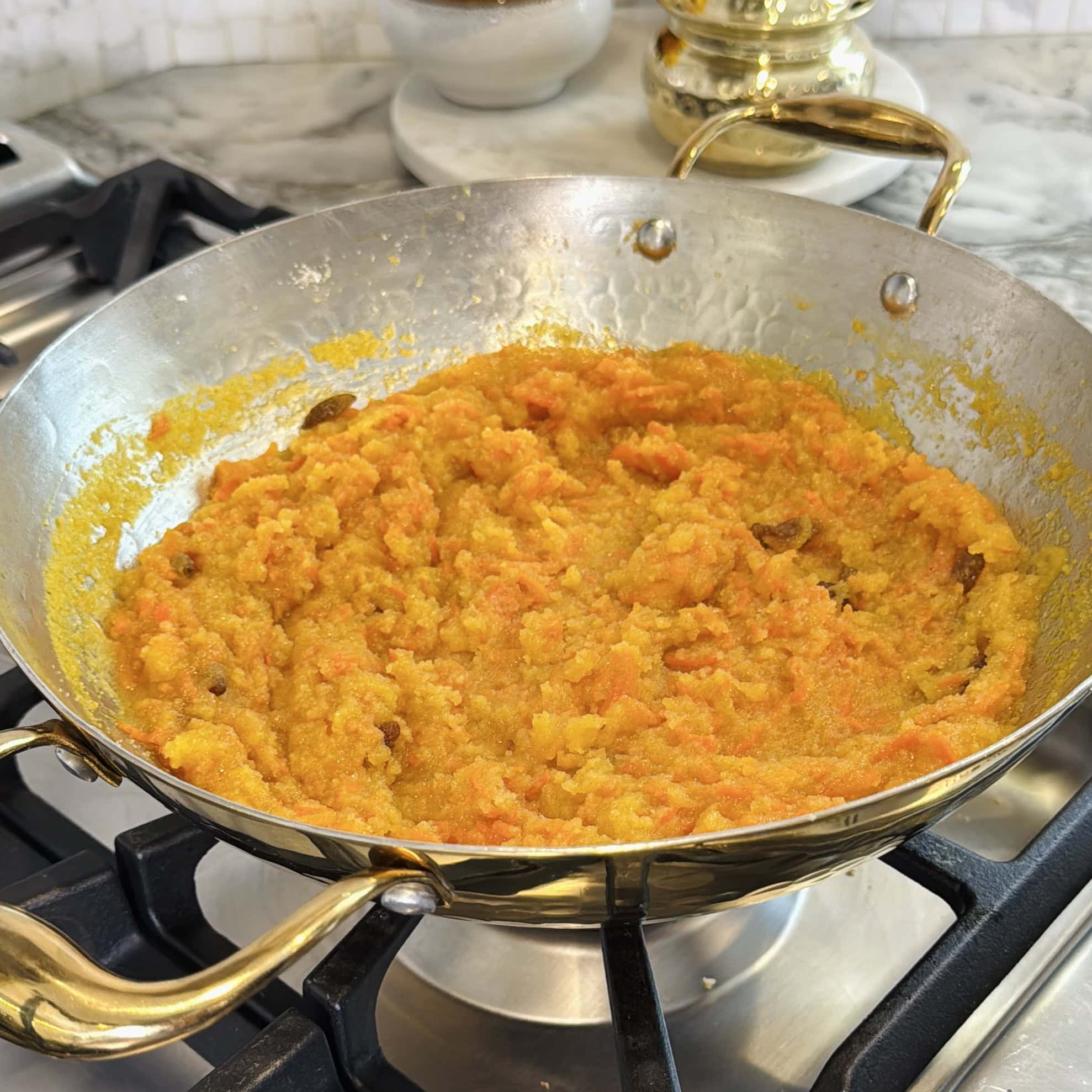 cooked sheera in a kadai.