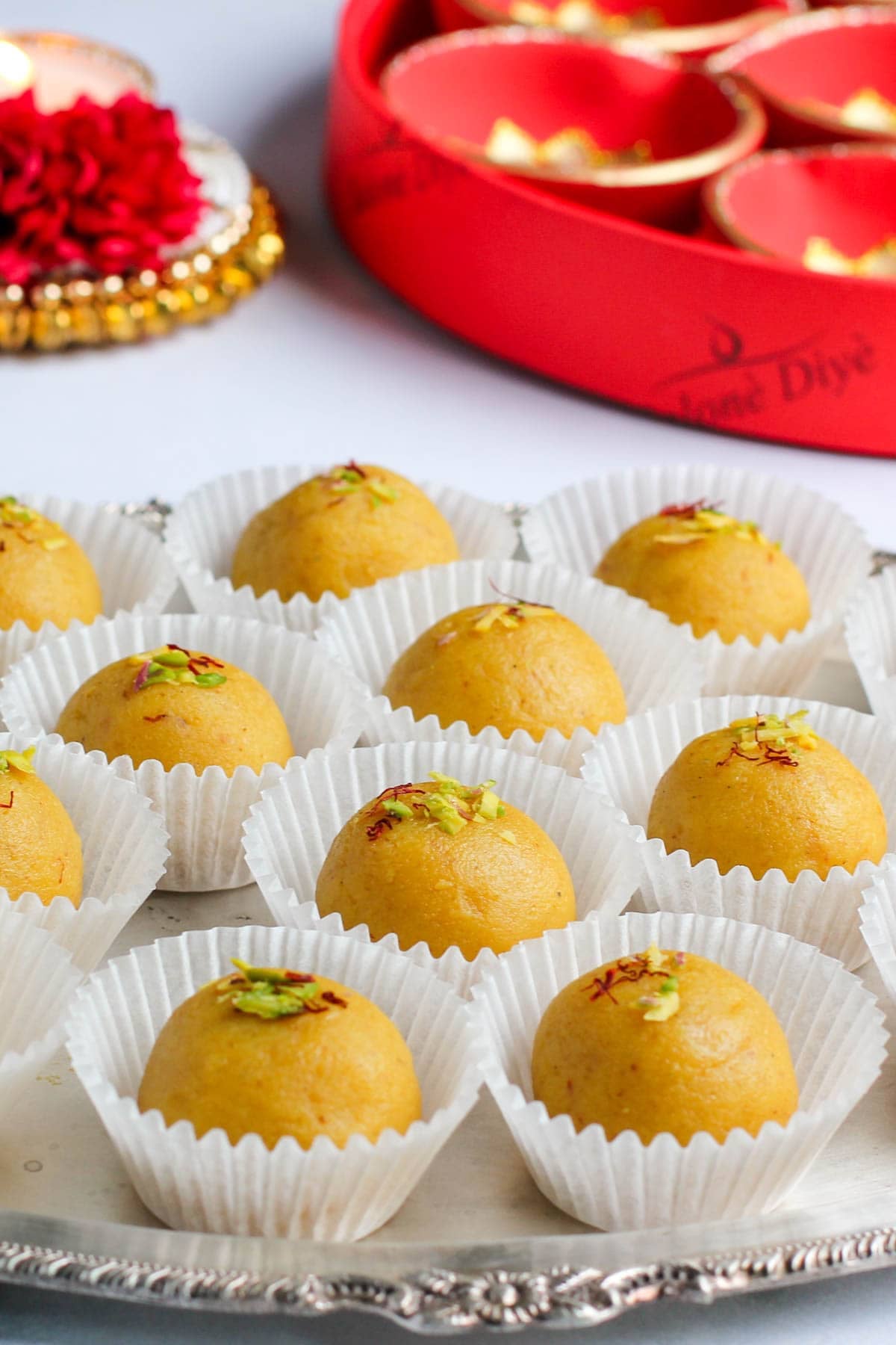 Kesar malai laddu in cupcake liners.