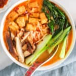 Miso soup with bok choy, mushrooms and tofu