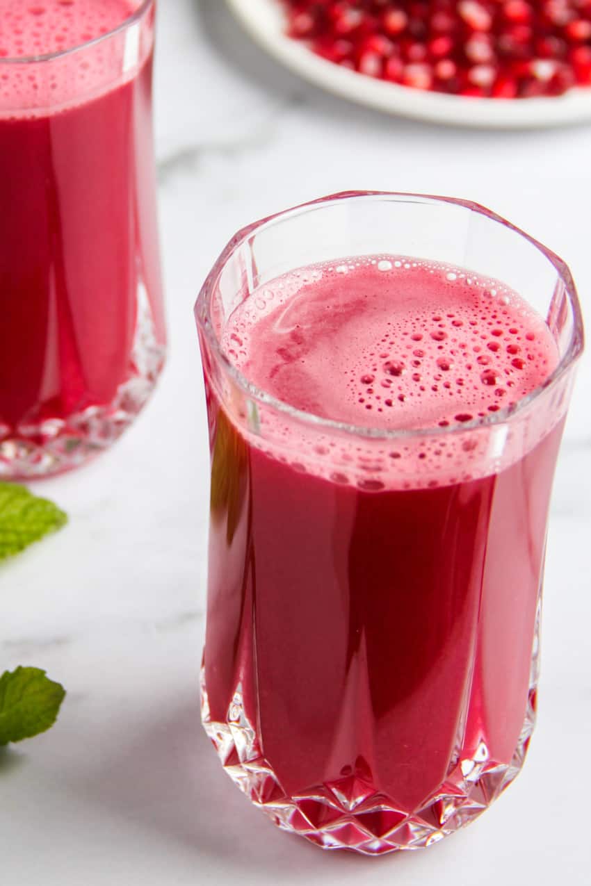 homemade pomegranate juice served in a glass