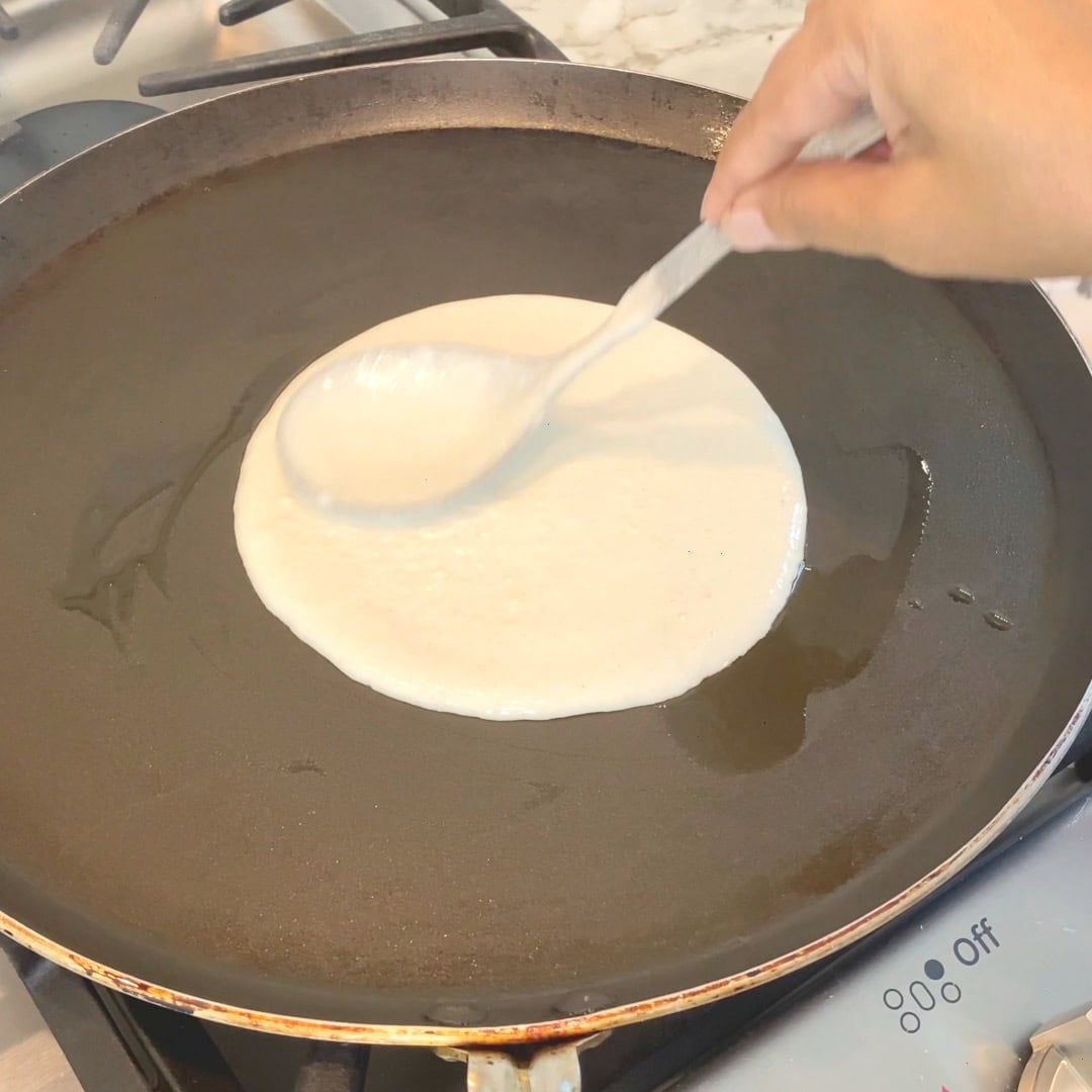 spreading batter on pan