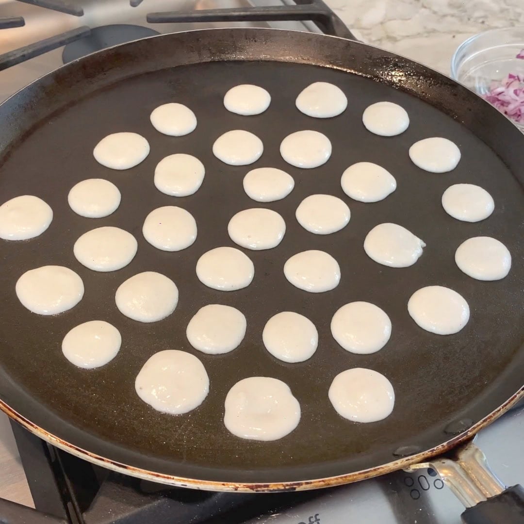 mini uttapam batter on pan