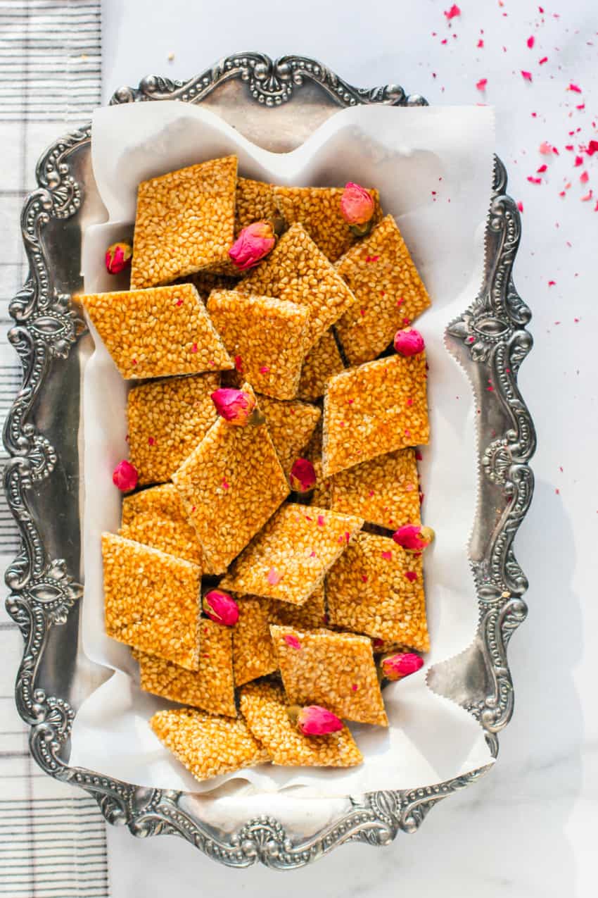 sesame crisps in a silver tray 