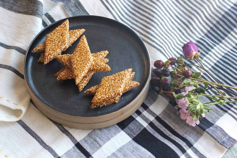 sesame chikki in a black plate