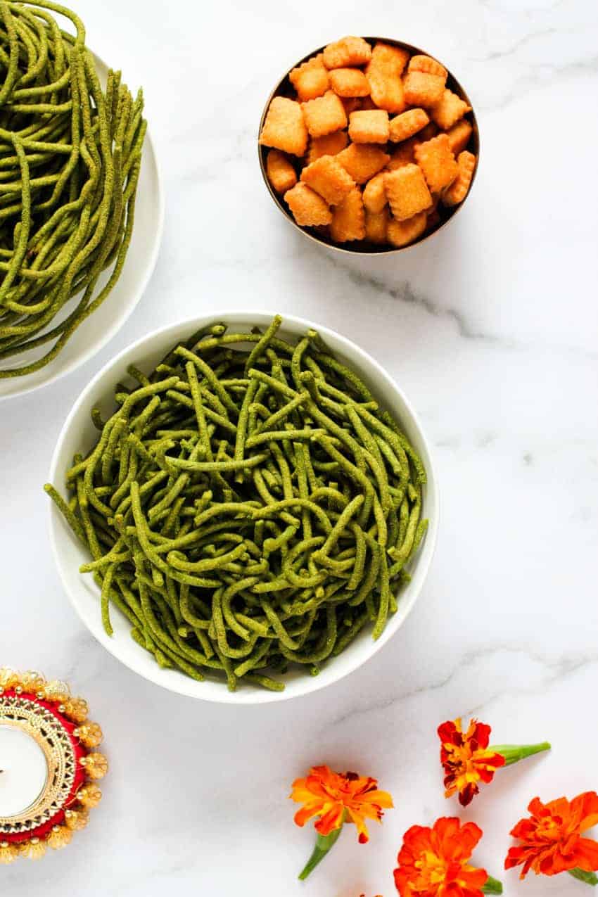 Spinach Sev in 2 bowls with Shankarpali on the side 