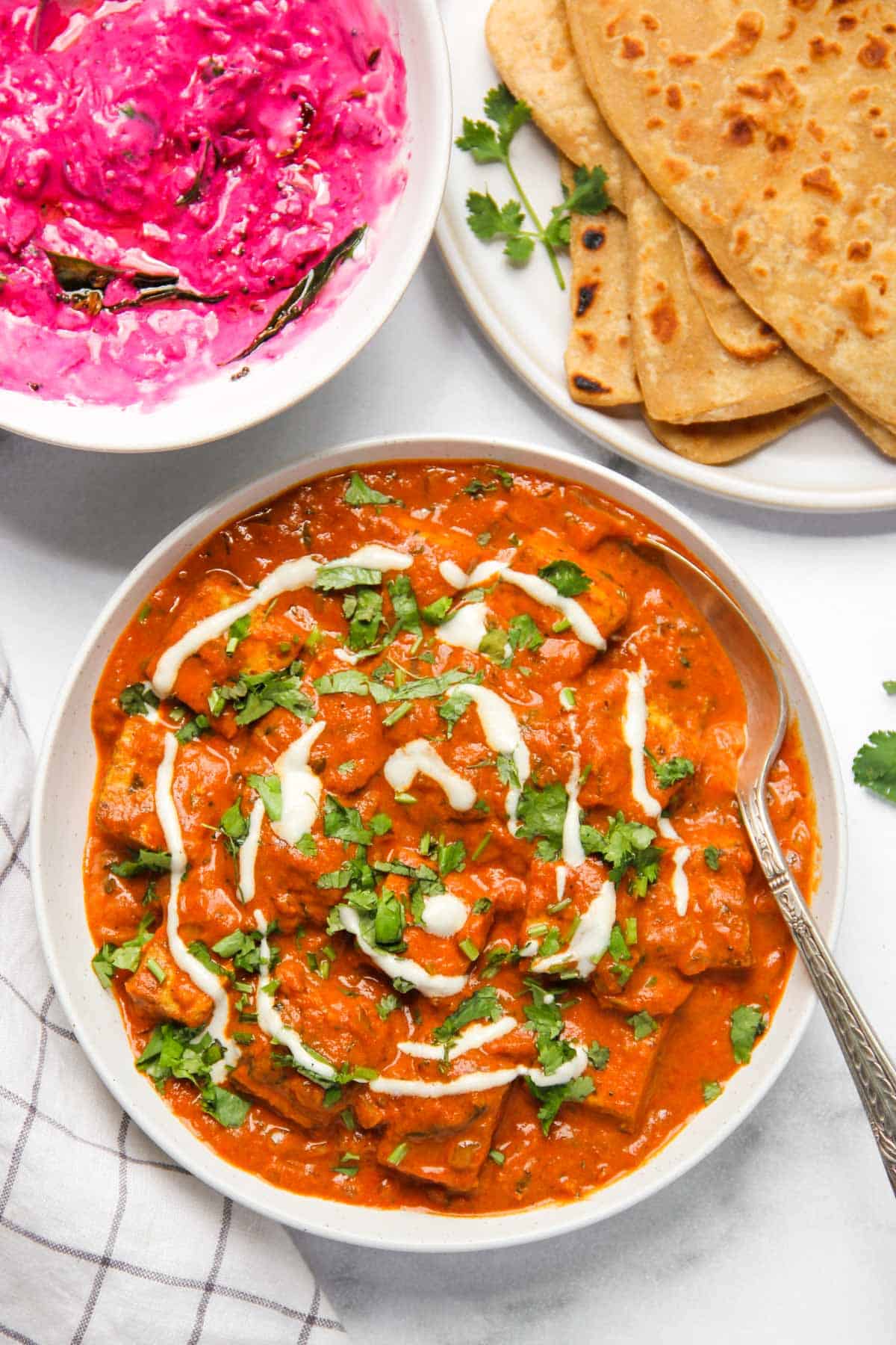 Tofu Makhani served with parathas and raita 
